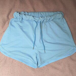 Light blue shorts with elastic waistband